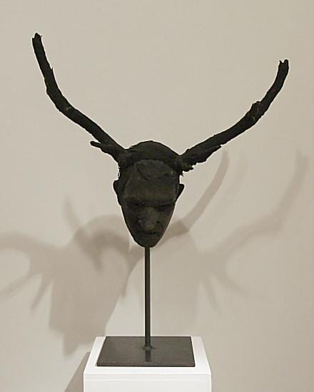 
To premodern head with antlers